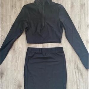 Black set of long sleeve top and skirt